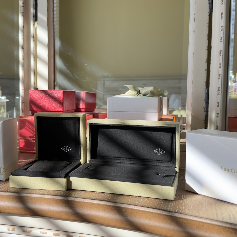 Van Cleef & Arpels Black and Cream Jewelry Boxes
